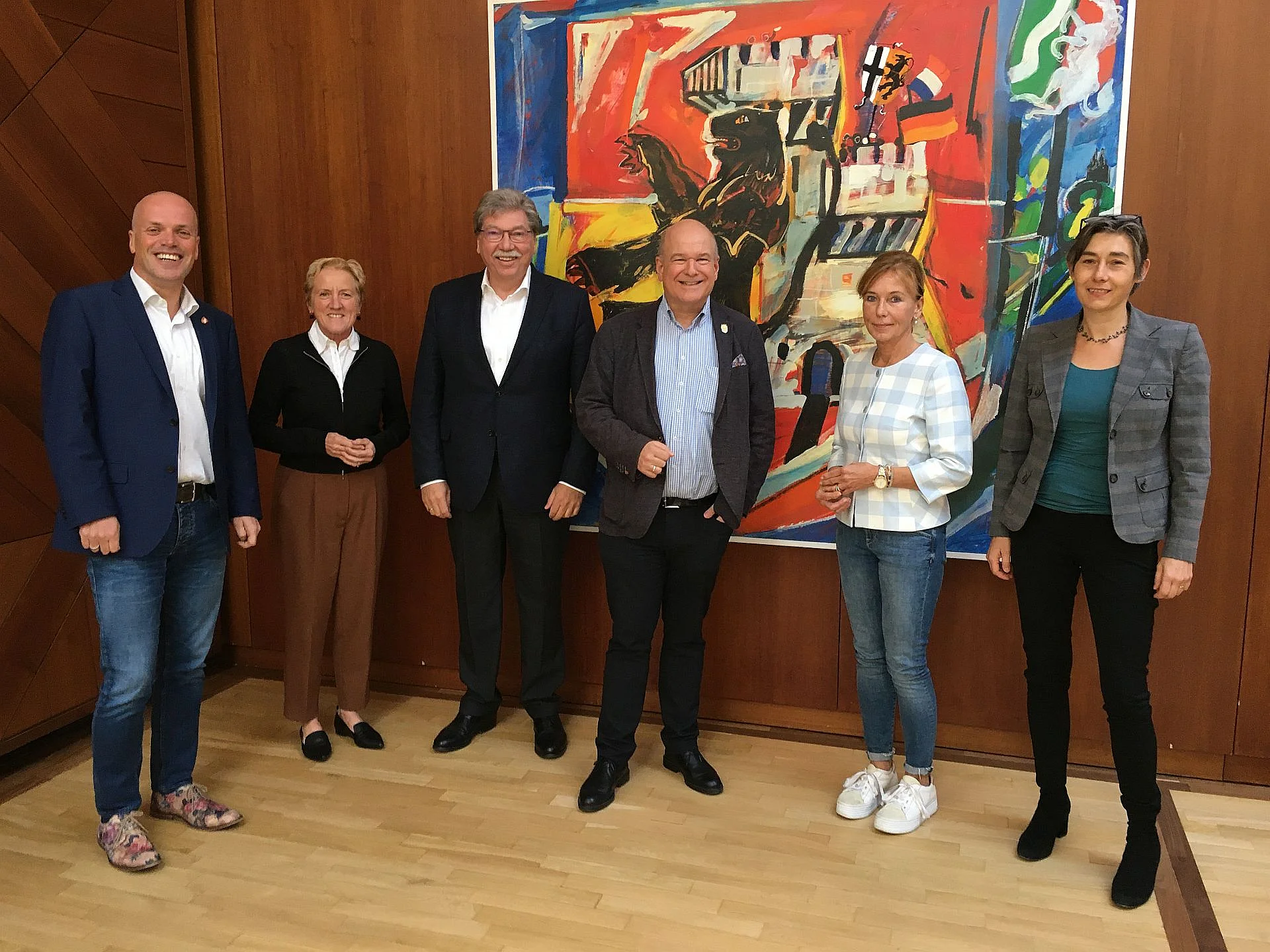 Foto der Beteiligten beim Erfahrungsaustausch zum Umgang mit Problemimmobilien