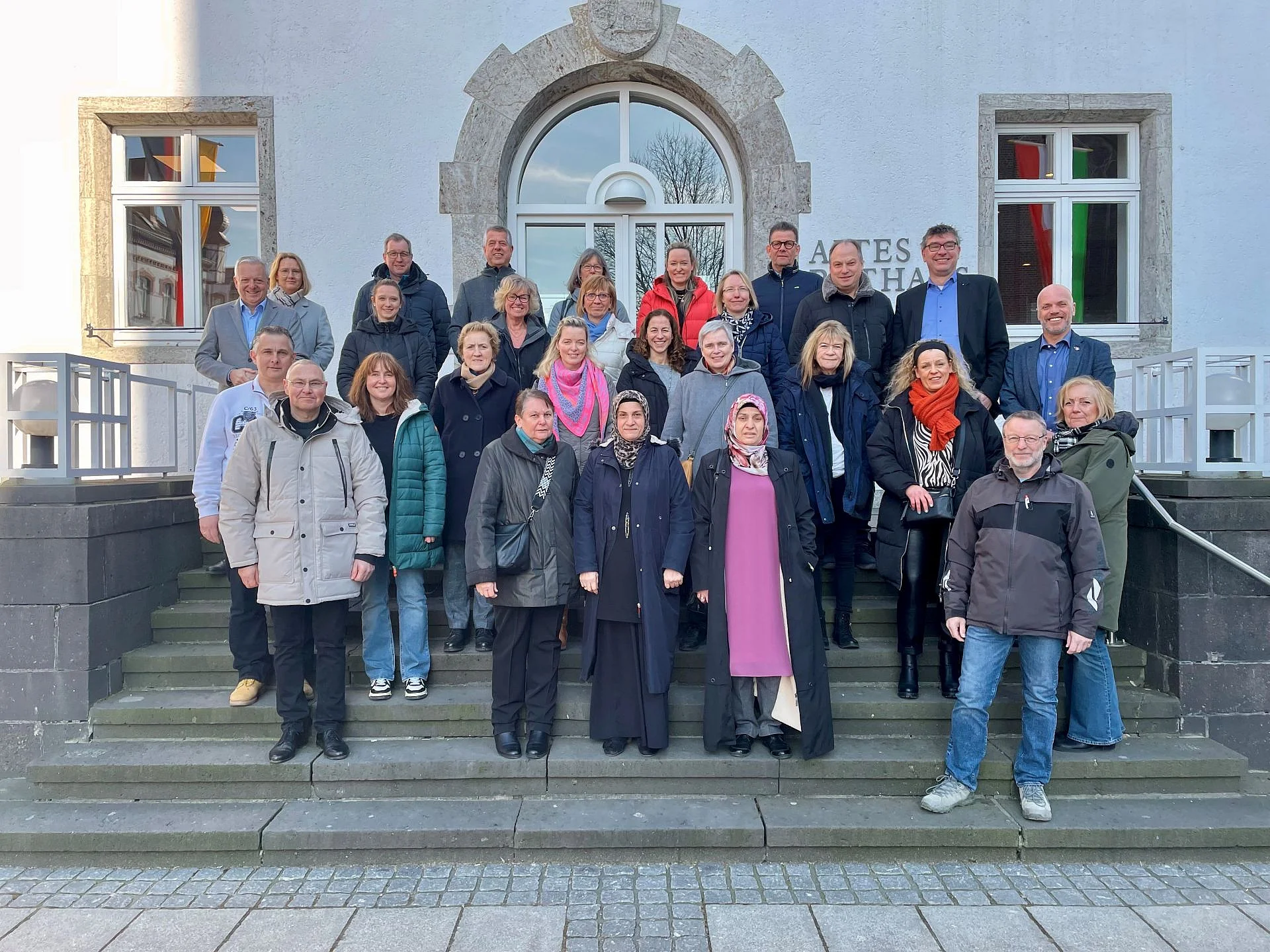 BM Klaus Krützen mit geehrten Mitarbeitern