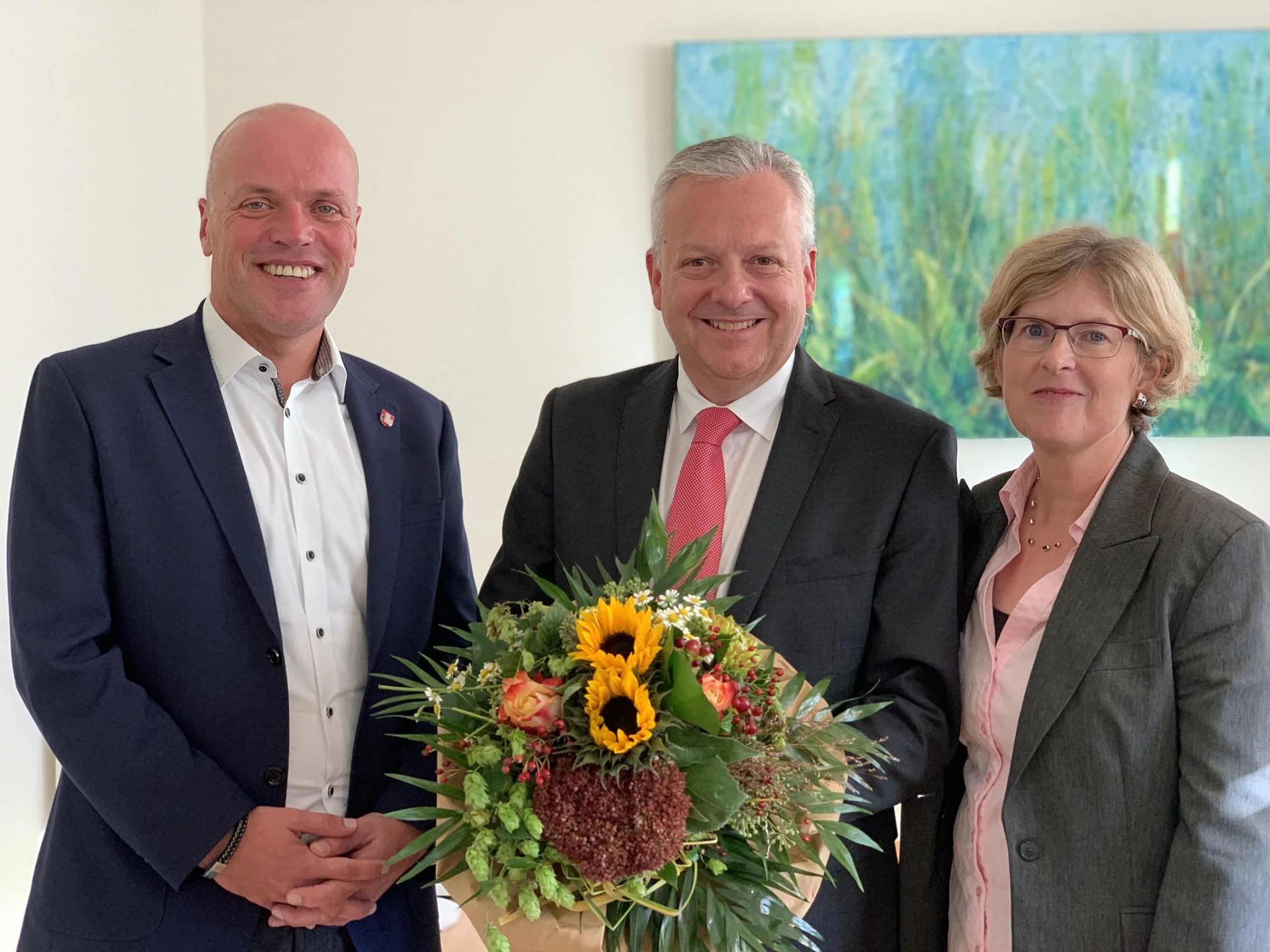 Foto: Bürgermeister Klaus Krützen, Arno Jansen mit seiner Frau Andrea