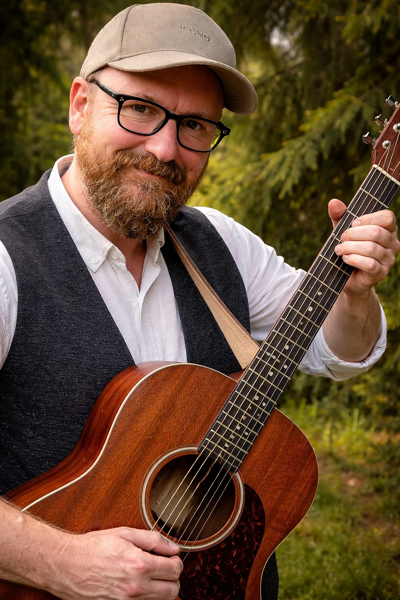 Foto von Stefan Pelzer-Florack mit Gitarre